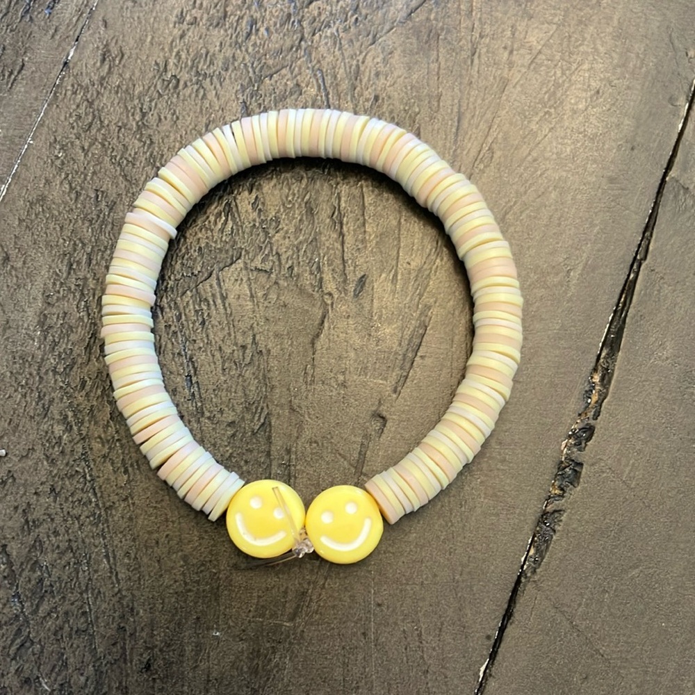 Yellow smiley face bracelet